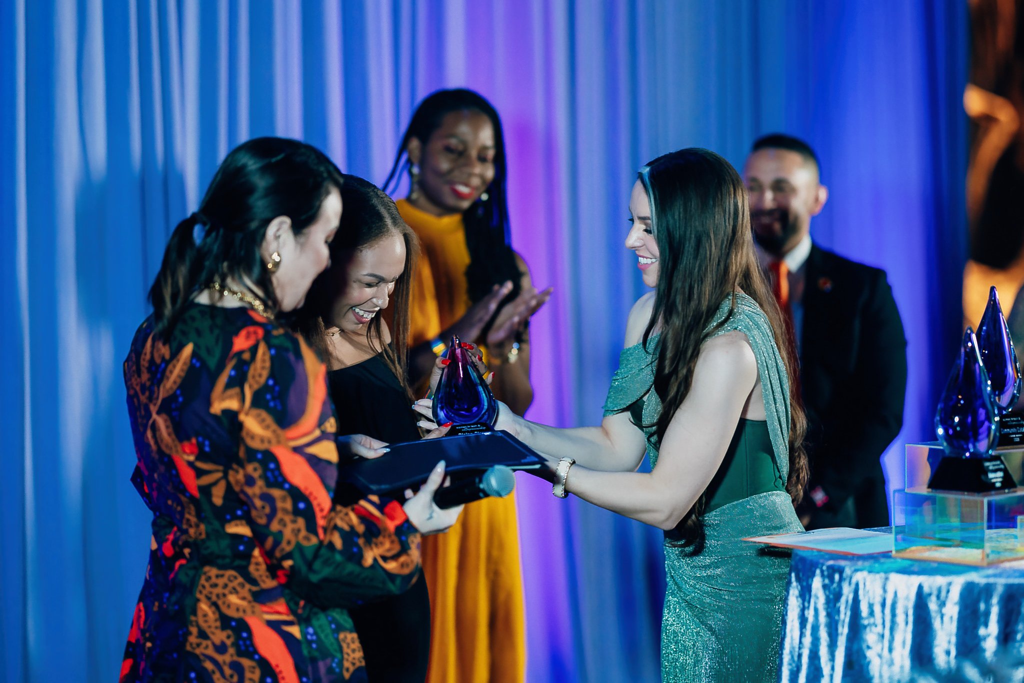 giving innovator award to winner